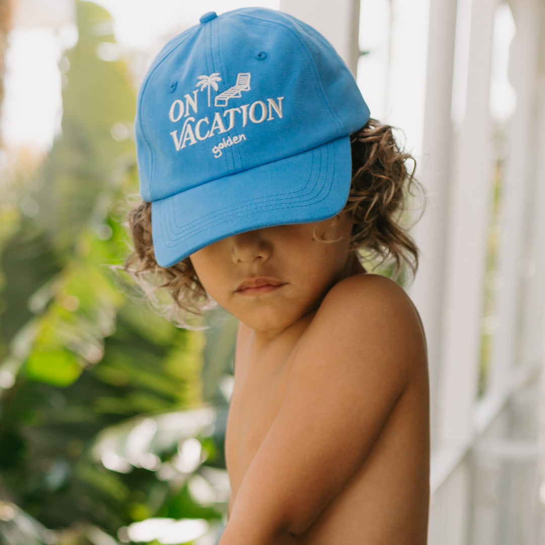 Golden Children On Vacation Cap Deep Sea Blue