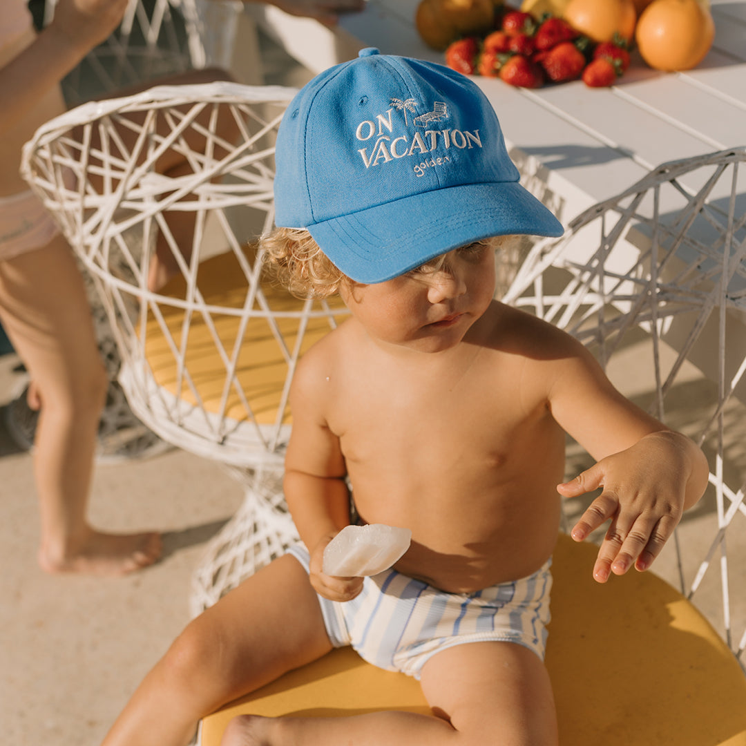 Golden Children On Vacation Cap Deep Sea Blue